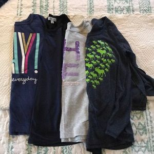 Bundle of four long sleeved girls tees. Size 7/8